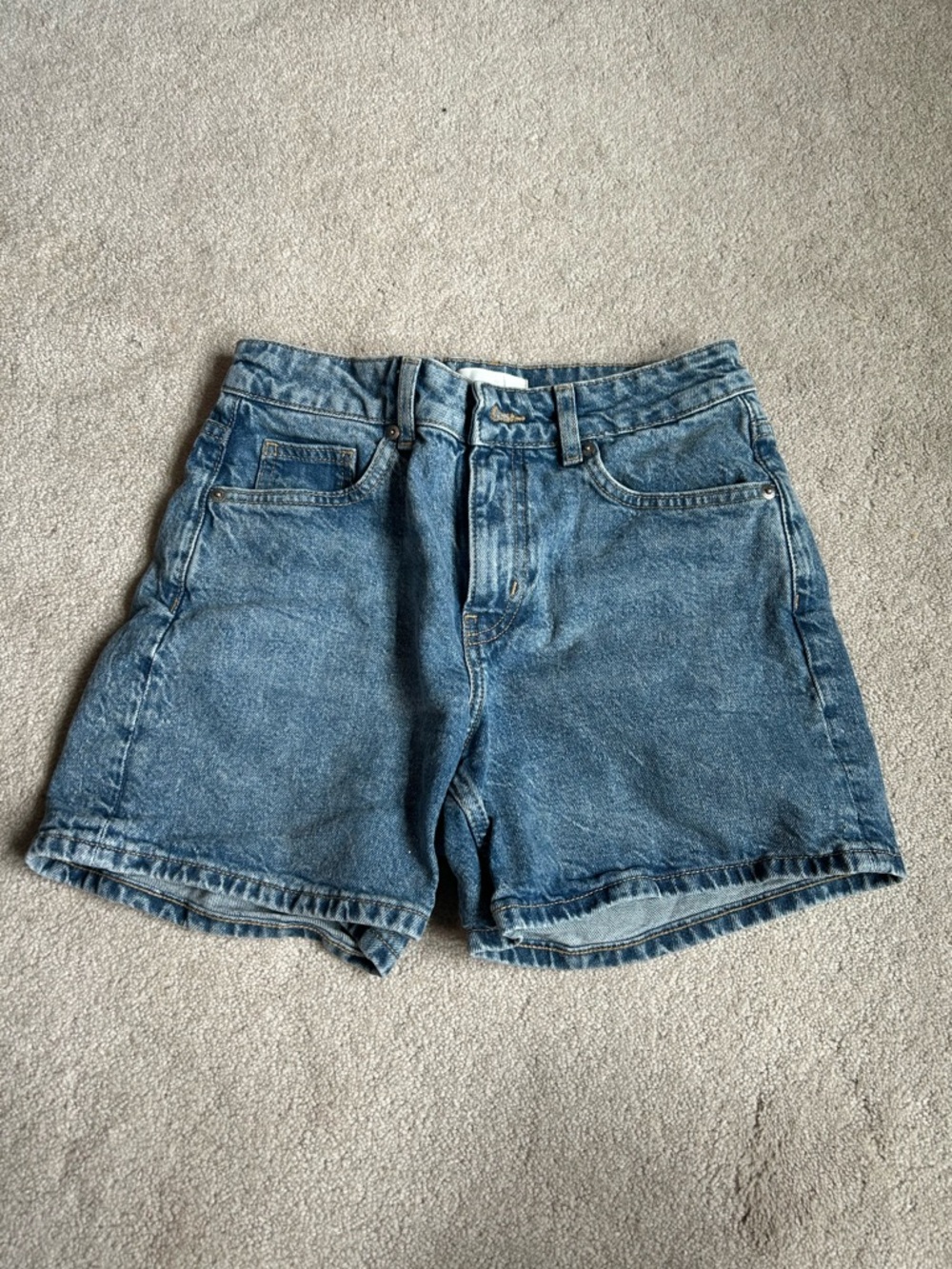 H&M high-waisted medium wash blue denim shorts
